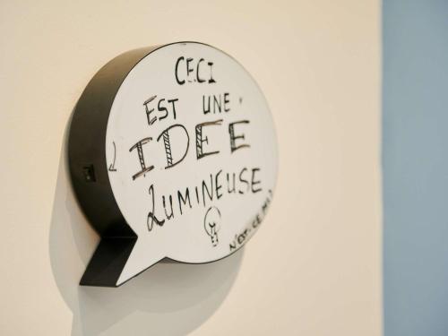 a speech bubble with the words best line office ambulance at ibis Lyon Gerland Musée des Confluences in Lyon