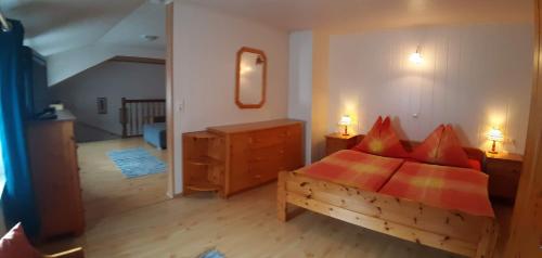 Postel nebo postele na pokoji v ubytování Appartements Königshofer