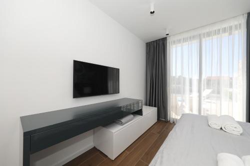 Ένα ή περισσότερα κρεβάτια σε δωμάτιο στο Homes4you K1