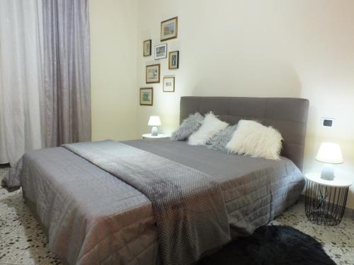 En eller flere senge i et værelse på Suite Mariasole