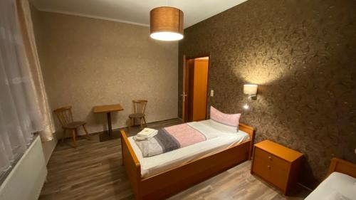 Postel nebo postele na pokoji v ubytování Schröder's Motel