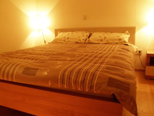 Un ou plusieurs lits dans un hébergement de l'établissement Apartments Vrdjan