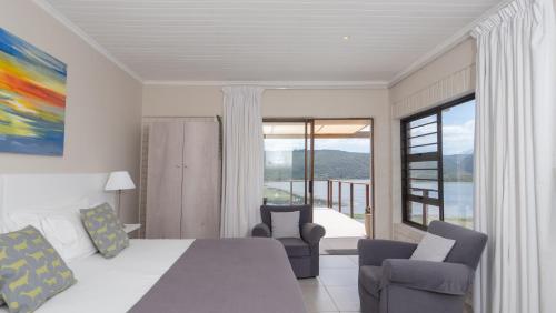 Ένα ή περισσότερα κρεβάτια σε δωμάτιο στο Interlaken Guest House