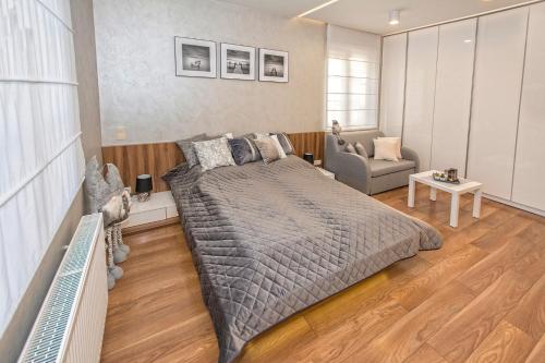 Posteľ alebo postele v izbe v ubytovaní KOMFORT HOUSE RYNEK