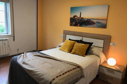 Säng eller sängar i ett rum på PISO A 400 METROS DE LA CATEDRAL