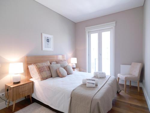 Postel nebo postele na pokoji v ubytování FLH Porto Bright Flat