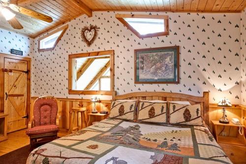 a bedroom with a bed in a room at Sticks and Stones in Sevierville