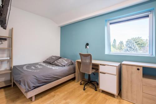 Postel nebo postele na pokoji v ubytování Résidence Sénac