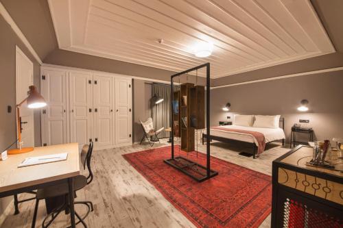 A bed or beds in a room at GARP HOTEL
