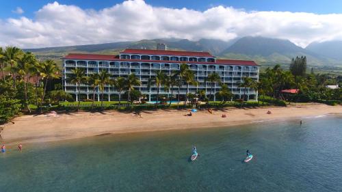 a beach with a large body of water at Lahaina Shores Beach Resort, a Destination by Hyatt Residence in Lahaina
