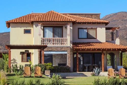 a rendering of a house with a roof at El Cielo Resort in Valle de Guadalupe