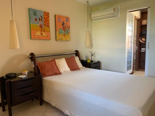 Ένα ή περισσότερα κρεβάτια σε δωμάτιο στο Flat Summer House Genipabu AGORA TÉRREO