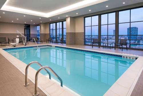 a large swimming pool in a hotel room at Hyatt House Chicago West Loop in Chicago