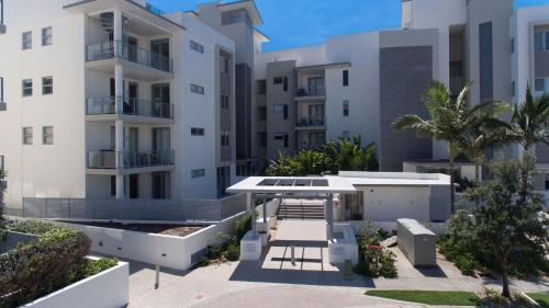 a view of the exterior of a building at White Shells Luxury Apartments Marcoola in Marcoola