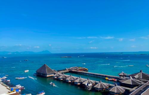 an aerial view of a resort in the water at Grace Hotel Semporna in Semporna