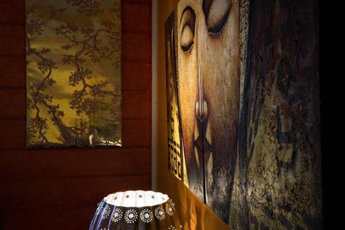 a room with a door and a lamp next to a wall at Chinoiserie - Blue Mountains Boho Luxe in Katoomba