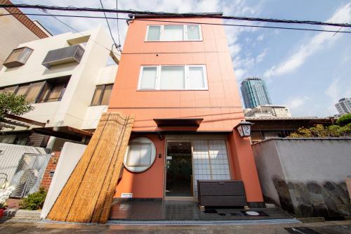 a house with an orange at Yado Hachiemon in Osaka