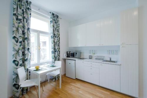 Kuchyň nebo kuchyňský kout v ubytování Modern apartment Spanelska