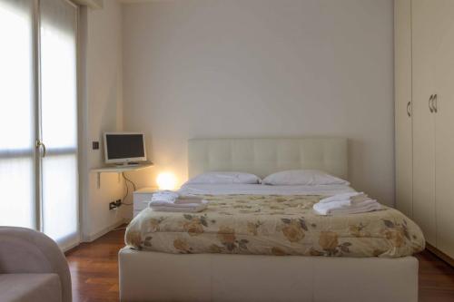 A bed or beds in a room at STUDIO ROMA 41 - Affitti Brevi Italia