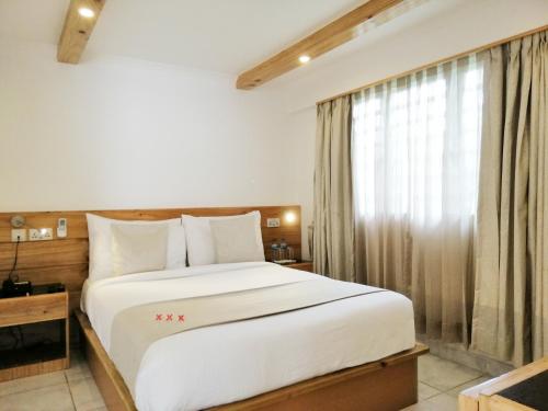 Postel nebo postele na pokoji v ubytování Le Relax Hotel and Restaurant