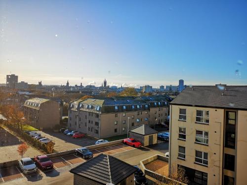 an aerial view of a city with buildings and cars at Mycosy At The Ocean in Aberdeen