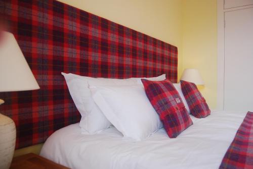 Postel nebo postele na pokoji v ubytování Stornoway Apartment
