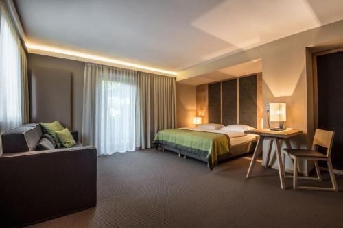 Postel nebo postele na pokoji v ubytování Hotel Arlara