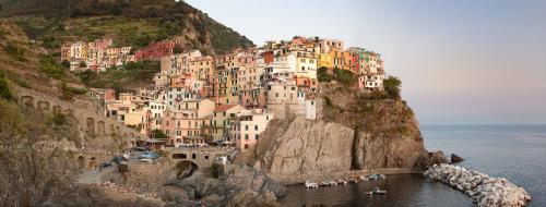a group of buildings on the side of a mountain at Incanto Manarola in Manarola