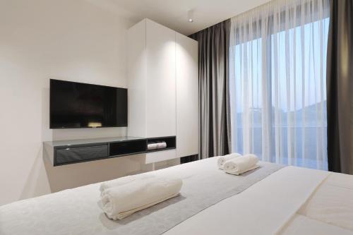 Ένα ή περισσότερα κρεβάτια σε δωμάτιο στο Homes4you K3