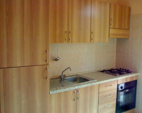 Кухня или мини-кухня в Casa a Villaggio Paradiso
