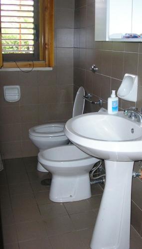 Ванная комната в Casa a Villaggio Paradiso