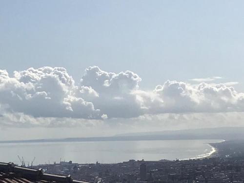 a view of a city and a body of water at Residenza Parco Gioeni in Catania