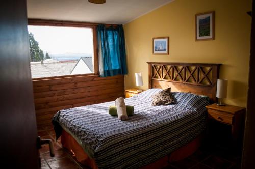 Postel nebo postele na pokoji v ubytování Patagonia Jazz Hostel