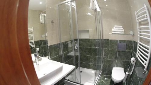 Koupelna v ubytování Hotel Astra