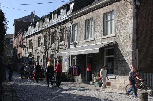 a group of people walking down a street at Villa Louise in Durbuy