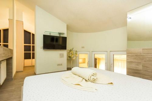 Wonderful penthouse in centr of Chisinau tesisinde bir odada yatak veya yataklar