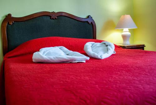 Ένα ή περισσότερα κρεβάτια σε δωμάτιο στο La Bergerac Boutique Hotel