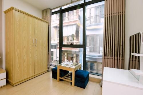 Postel nebo postele na pokoji v ubytování Tuan Anh Hotel