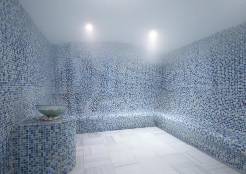 Ванна кімната в Rubi Platinum Spa Resort & Suites