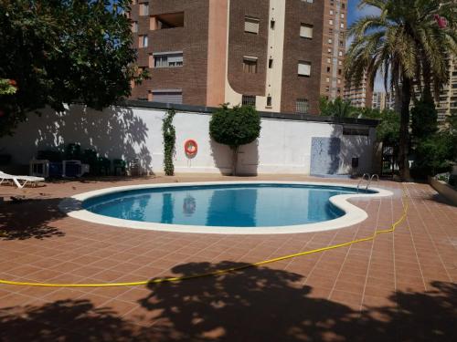 Bazén v ubytování MODERNO APARTAMENTO Zona Playa de Levante nebo v jeho okolí