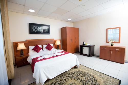 Katil atau katil-katil dalam bilik di Mayfair Hotel