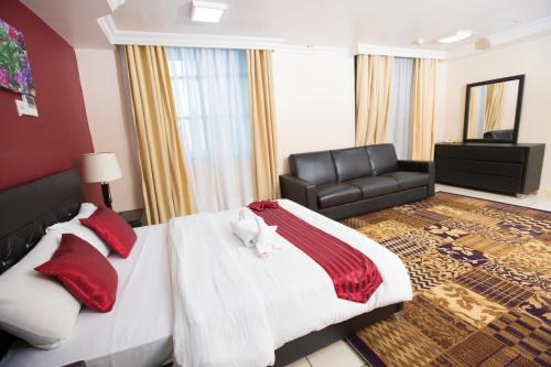 Katil atau katil-katil dalam bilik di Mayfair Hotel