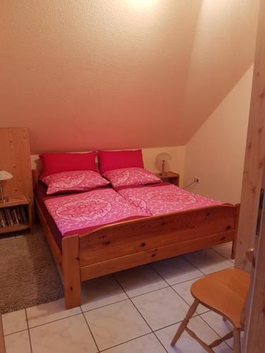 Ένα ή περισσότερα κρεβάτια σε δωμάτιο στο Garten Eden