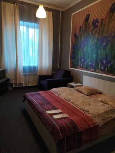 Postel nebo postele na pokoji v ubytování Mini Hotel na Gasheka