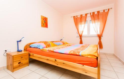 Posteľ alebo postele v izbe v ubytovaní Apartmani Andreas