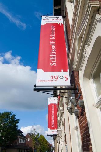 a sign for a restaurant on the side of a building at Hotel Tenbrock - Restaurant 1905 in Gescher