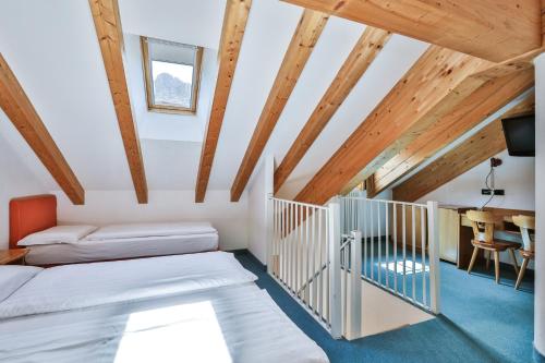 Ein Bett oder Betten in einem Zimmer der Unterkunft MyTime Hotels Savoy