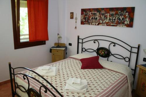 Posteľ alebo postele v izbe v ubytovaní Agriturismo Ai Due Laghi