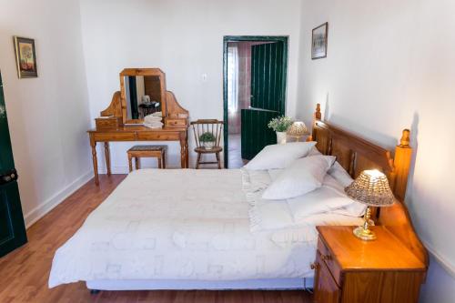Ένα ή περισσότερα κρεβάτια σε δωμάτιο στο 3 Darling Street Guest House