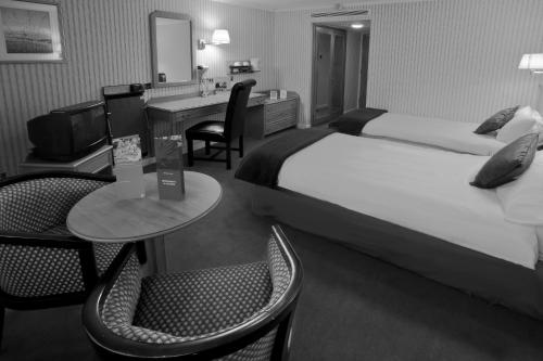 Postel nebo postele na pokoji v ubytování Britannia Hotel Coventry